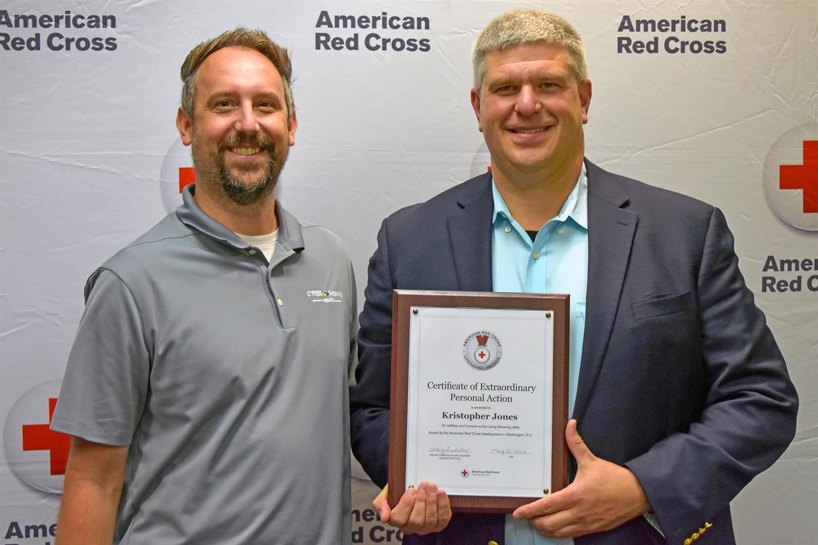 CFISD Assistant Director of Aquatics Kris Jones, right, was honored by the American Red Cross.
